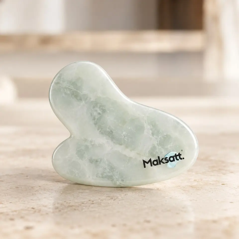 Facial Massage Stone (Gua Sha) — digital packaging concept, view 1 of 3